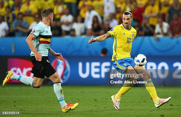 Zlatan Ibrahimovic of Sweden takes on Toby Alderweireld of Belgium during the UEFA EURO 2016 Group E match between Sweden and Belgium at Allianz...