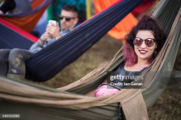 Festival goers enjoy the atmosphere during the Glastonbury Festival at Worthy Farm, Pilton on June 22, 2016 in Glastonbury, England. Now its 46th...