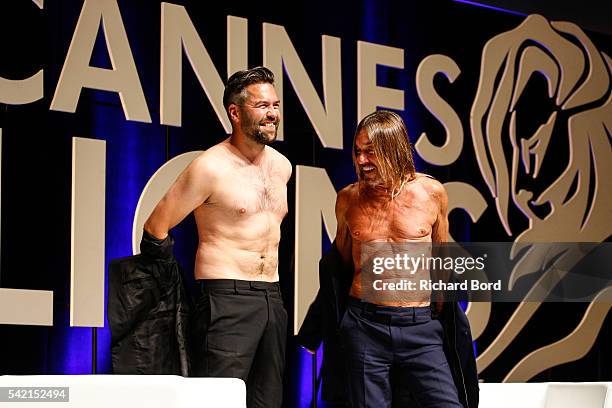 Nils Leonard, Chairman and Chief Creative Officer of Grey London, and Iggy Pop go topless after the 'Do Not Go Gentle' seminar hosted by Grey during...