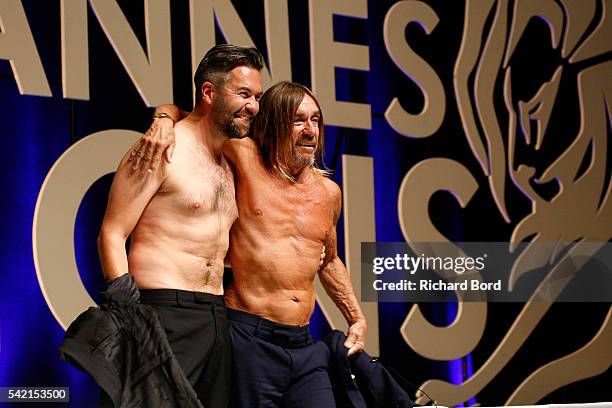 Nils Leonard, Chairman and Chief Creative Officer of Grey London, and Iggy Pop go topless after the 'Do Not Go Gentle' seminar hosted by Grey during...