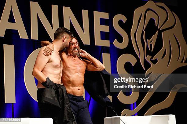 Nils Leonard, Chairman and Chief Creative Officer of Grey London, and Iggy Pop go topless after the 'Do Not Go Gentle' seminar hosted by Grey during...