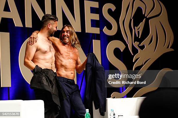 Nils Leonard, Chairman and Chief Creative Officer of Grey London, and Iggy Pop go topless after the 'Do Not Go Gentle' seminar hosted by Grey during...