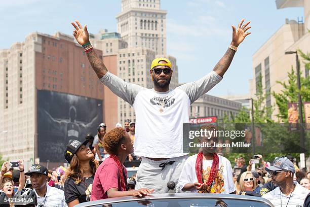 LeBron James of the Cleveland Cavaliers celebrates during the Cleveland Cavaliers 2016 championship victory parade and rally on June 22, 2016 in...