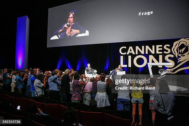 Photographers surround Iggy Pop and Nils Leonard during the 'Do Not Go Gentle' seminar hosted by Grey during The Cannes Lions Festival 2016 on June...