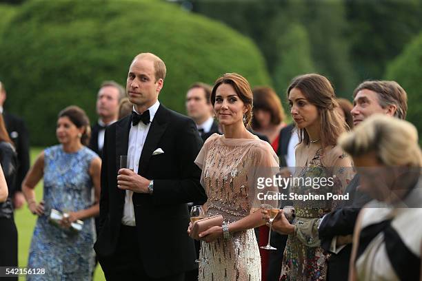 Prince William and Catherine, Duchess of Cambridge and Rose Cholmondeley, the Marchioness of Cholmondeley, attend a gala dinner in support of East...