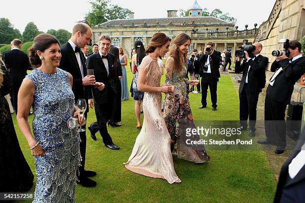 Prince William, Catherine, Duchess of Cambridge and Rose Cholmondeley, the Marchioness of Cholmondeley attend a gala dinner in support of East...