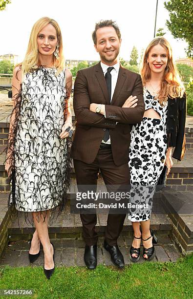 Lauren Santo Domingo, Derek Blasberg and Eugenie Niarchos attend a private dinner hosted by Michael Kors to celebrate the new Regent Street Flagship...