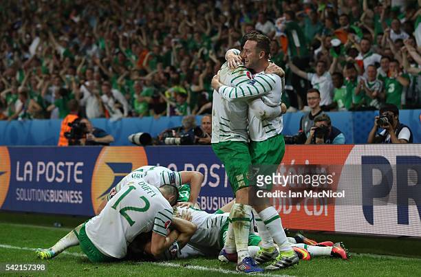 Robbie Brady of Republic of Ireland celebrates after he scores during the UEFA EURO 2016 Group E match between Italy and Republic of Ireland at Stade...