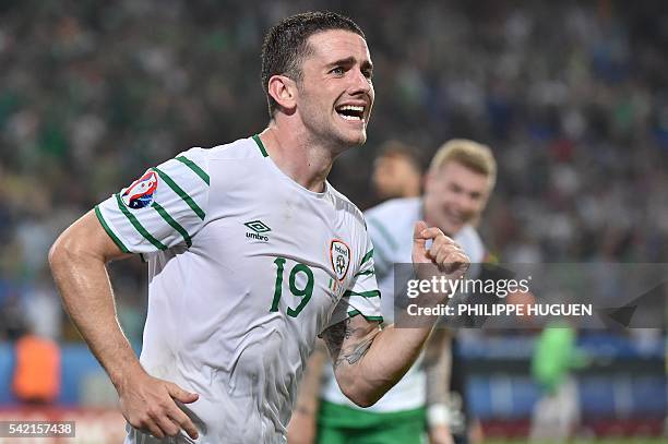 Ireland's midfielder Robert Brady celebrates scoring a goal during the Euro 2016 group E football match between Italy and Ireland at the...