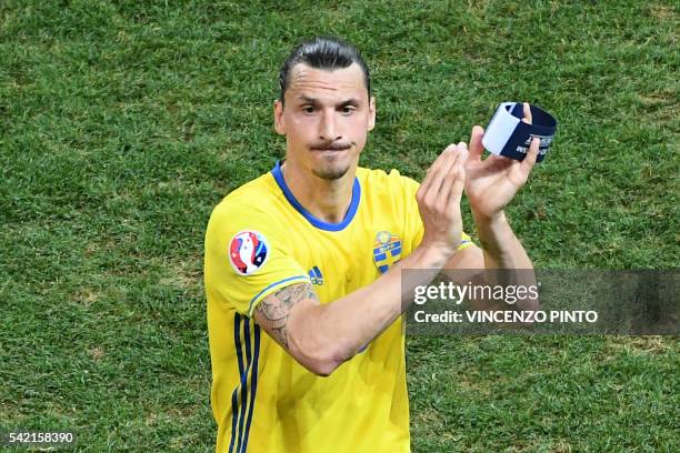 Sweden's forward Zlatan Ibrahimovic acknowledges the crowd after Sweden lost 0-1 in the Euro 2016 group E football match between Sweden and Belgium...