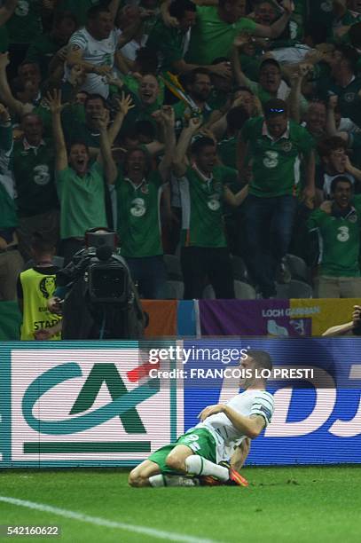 Ireland's midfielder Robert Brady celebrates after scoring during the Euro 2016 group E football match between Italy and Ireland at the Pierre-Mauroy...