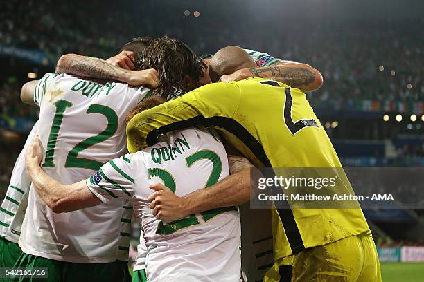 The Ireland players celebrate at the end of the UEFA EURO 2016 Group E match between Italy and Republic of Ireland at Stade Pierre-Mauroy on June 22,...