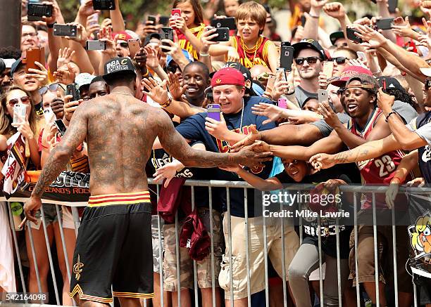 Smith of the Cleveland Cavaliers greets fans during the Cleveland Cavaliers 2016 NBA Championship victory parade and rally on June 22, 2016 in...