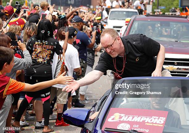 Cleveland Cavaliers General Manager David Griffin waves at fans during the Cleveland Cavaliers Victory Parade And Rally on June 22, 2016 in downtown...