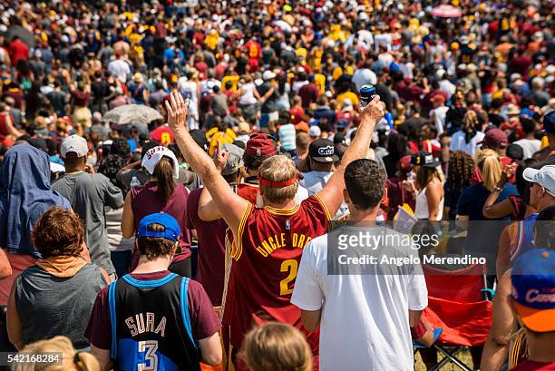 Cleveland fans celebrate during the Cleveland Cavaliers 2016 NBA Championship victory parade and rally on June 22, 2016 in Cleveland, Ohio. The...