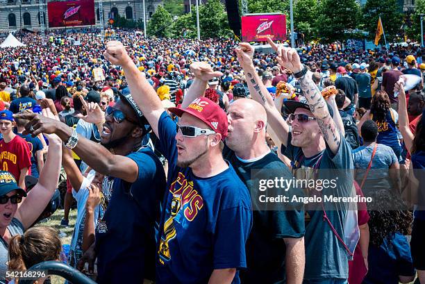 Cleveland fans celebrate during the Cleveland Cavaliers 2016 NBA Championship victory parade and rally on June 22, 2016 in Cleveland, Ohio. The...