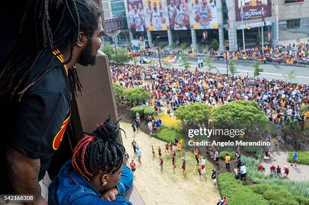 Cleveland fans celebrate during the Cleveland Cavaliers 2016 NBA Championship victory parade and rally on June 22, 2016 in Cleveland, Ohio. The...