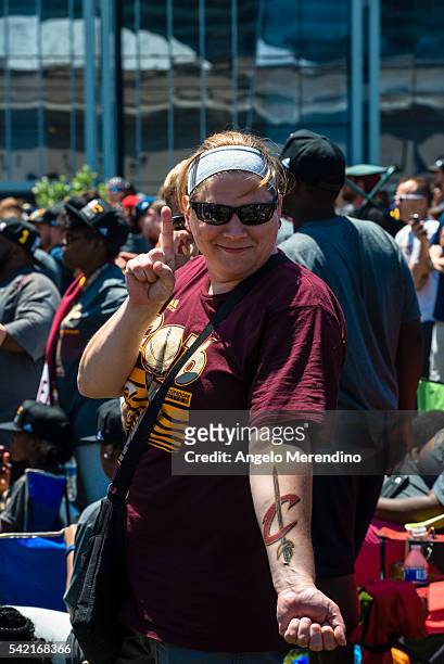 Cleveland resident Tara Linville shows her tattoo during the Cleveland Cavaliers 2016 NBA Championship victory parade and rally on June 22, 2016 in...
