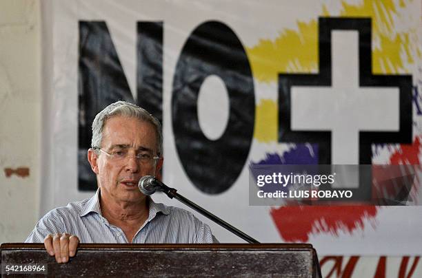 Colombian former president, senator Alvaro Uribe speaks during a signature protest "For the Peace We Want" against the peace talks between the...