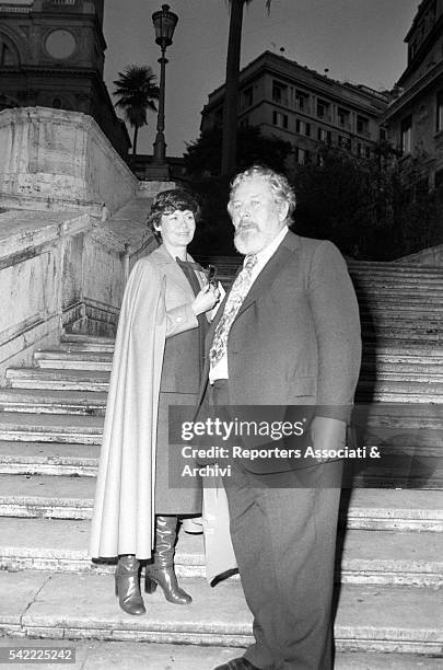British actor Peter Ustinov and his wife Helene du Lau d'Allemans on the stairs of Trinità dei Monti. Rome, 12th February 1977