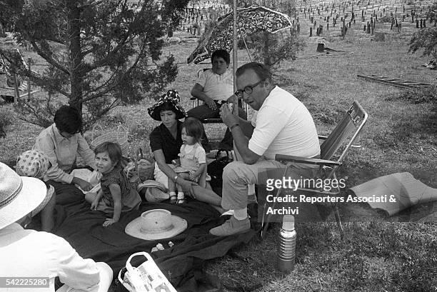 Italian director Sergio Leone with his wife Carla and daughters Raffaella and Francesca on the set of The Good, the Bad and the Ugly. 1966