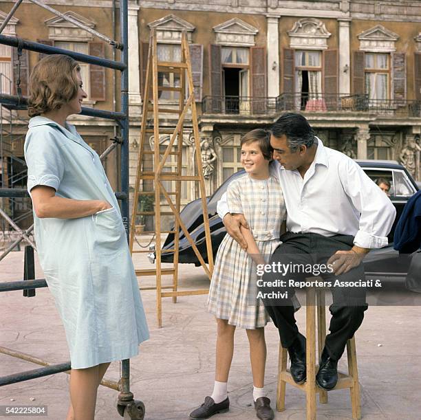 Swedish actress Ingrid Bergman with her daughter, Italian actress Isabella Rossellini, and Mexican-American actor Anthony Quinn on the set of The...
