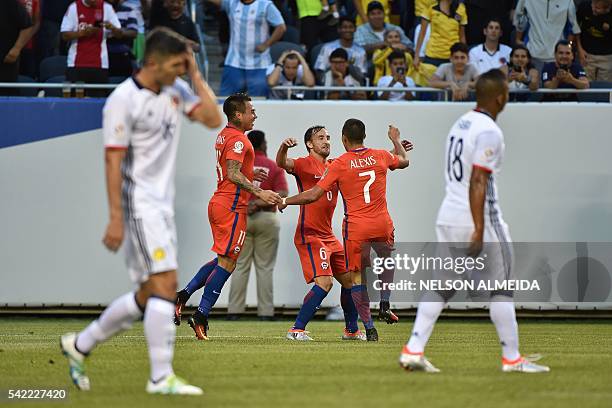 Chile's Jose Fuenzalida celebrates with Eduardo Vargas and Alexis Sanchez after scoring against Colombia during the Copa America Centenario semifinal...