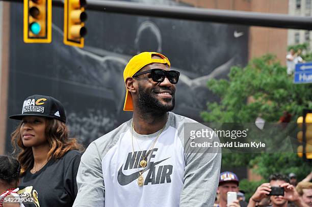 LeBron James of the Cleveland Cavaliers waves to the fans during the Cleveland Cavaliers Victory Parade And Rally on June 22, 2016 in downtown...