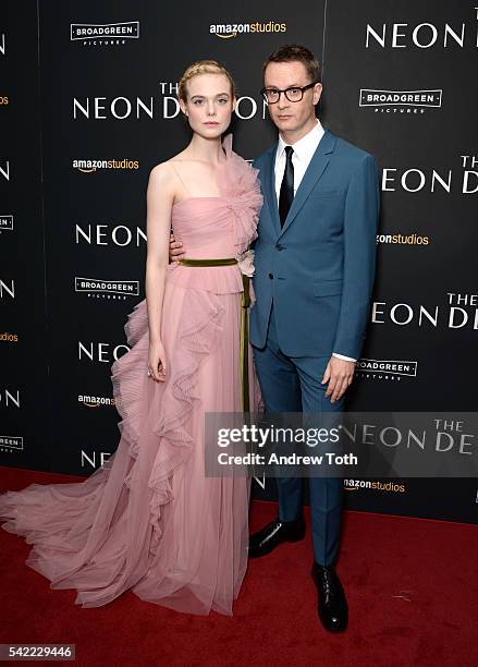 Elle Fanning and Nicolas Winding Refn attend the "The Neon Demon" New York premiere at Metrograph on June 22, 2016 in New York City.