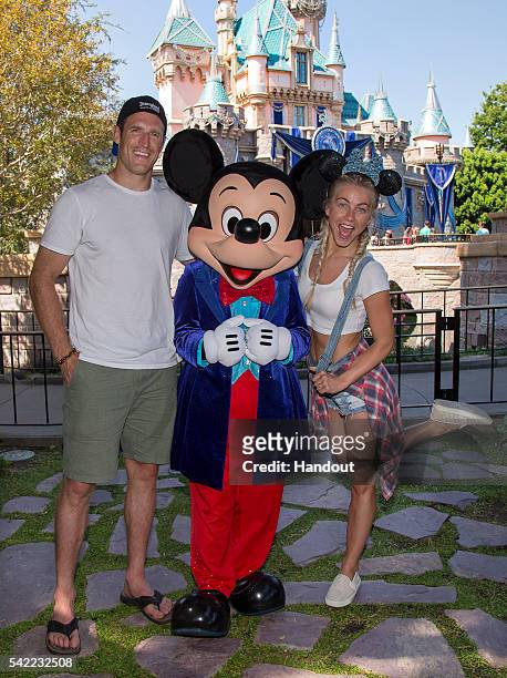 Dancer/Actress Julianne Hough and fiance Brooks Laich of the Toronto Maple Leafs visit Sleeping Beauty Castle with Mickey Mouse at Disneyland park on...