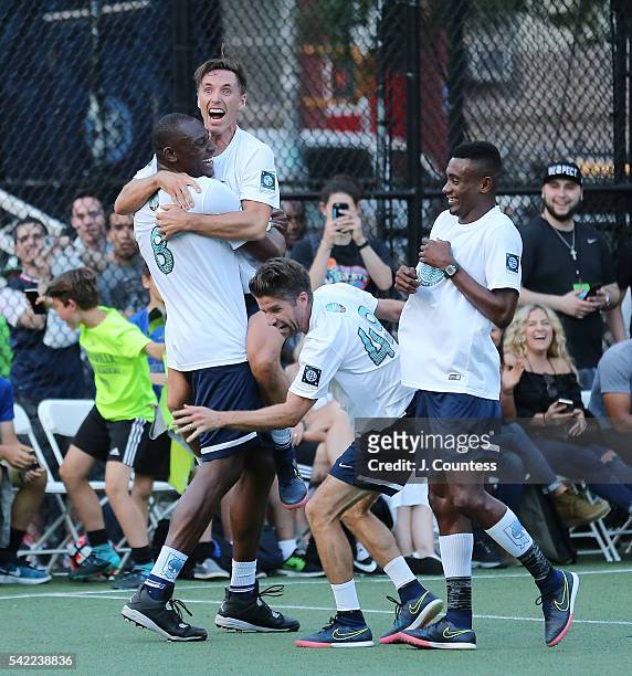 Retired NBA Player Steve Nash and his charity team celebrate a goal scored during the 2016 Steve Nash Foundation Showdown at Sara D. Roosevelt Park...