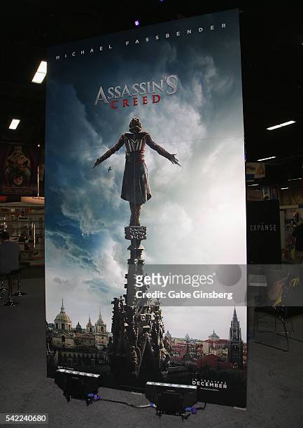 Poster for the upcoming movie "Assassin's Creed" is displayed in the Ubisoft booth at the Licensing Expo 2016 at the Mandalay Bay Convention Center...