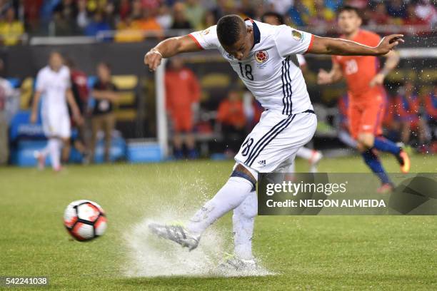 Colombia's Frank Fabra shoots during a Copa America Centenario semifinal football match against Chile in Chicago, Illinois, United States, on June...