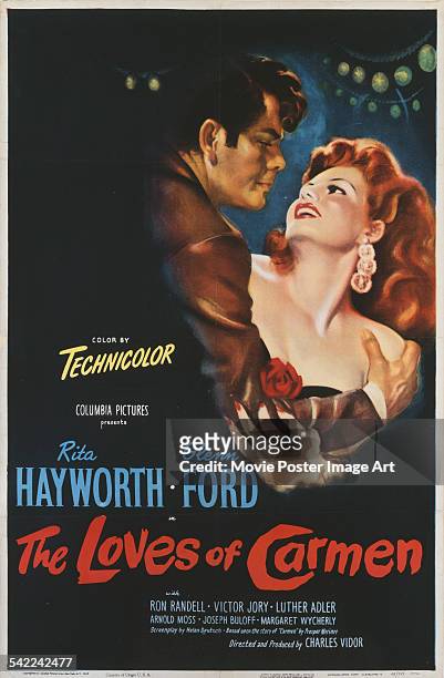 Actors Glenn Ford and Rita Hayworth appear on the poster for the Columbia Pictures film 'The Loves Of Carmen', with colour by Technicolor, 1948. The...
