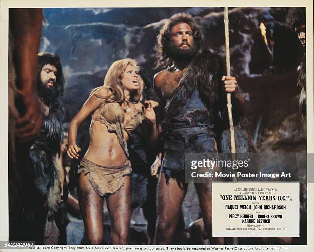 Actors Raquel Welch and John Richardson appear on a poster for the Hammer Films production 'One Million Years B.C.', 1966.