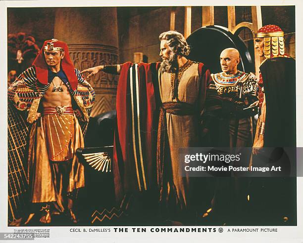 Actors Charlton Heston and Yul Brynner appear on the poster for the Paramount Pictures film 'The Ten Commandments', 1956. The film was directed by...