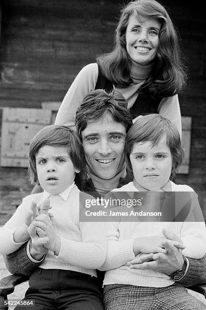 French singer, composer and jazz guitarist Sacha Distel with his wife championship Olympic skier Francine Bréaud and their sons Julien and Laurent .