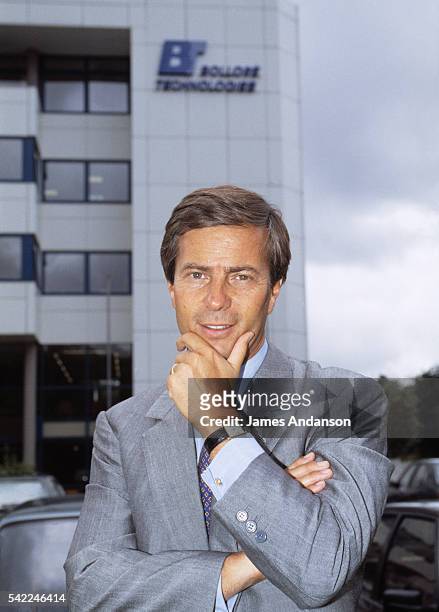 Investor and entrepreneur Vincent Bollore stands in front of the "Bollore Technologies" building, one of his many holdings, in Odet. | Location:...
