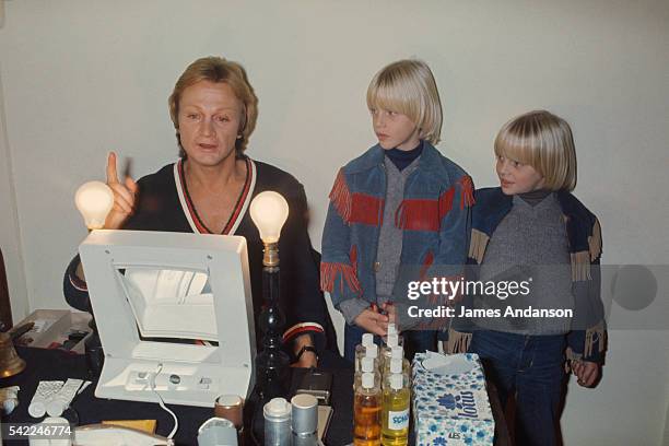 French singer Claude Francois with his two sons, Claude and Marc in his dressing room where he prepares for his first acting role in the film Droles...