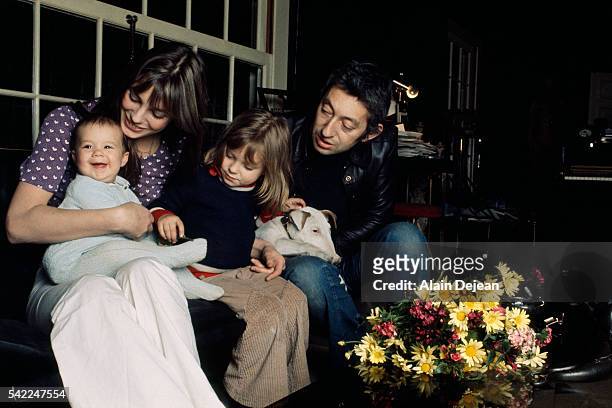 French singer and songwriter Serge Gainsbourg with his partner British singer and actress Jane Birkin, their daughter Charlotte , and Jane's...