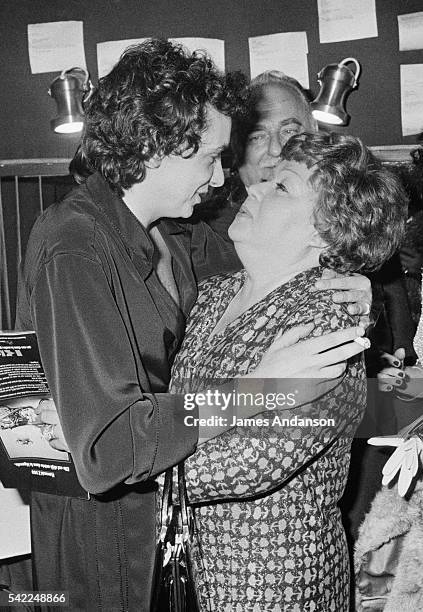 French singer Michel Sardou is congratulated by his mother Jacqueline Labbé, well-known French actress Jackie Rollin or Jacky Sardou , in front of...
