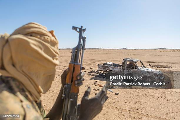 Soldiers of the Chadian Army on Patrol in area of Kidal in Mali. A vehicule belonging to the djihadists has been destroyed by the French air force....