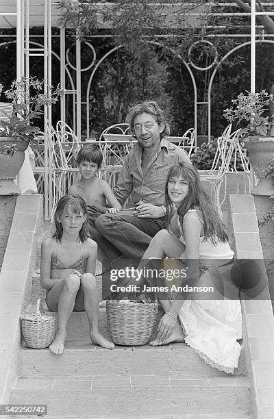 British singer and actress Jane Birkin with French singer and composer Serge Gainsbourg and their daughter Charlotte and Birkin's daughter Kate Barry...