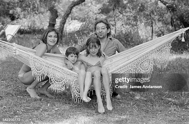 British singer and actress Jane Birkin with French singer and composer Serge Gainsbourg and their daughter Charlotte and Birkin's daughter Kate Barry...