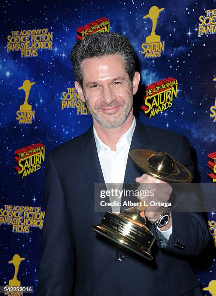 Actor Simon Kinberg poses in the pressroom at the 42nd annual Saturn Awards at The Castaway on June 22, 2016 in Burbank, California.