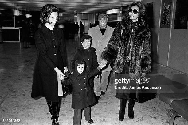 Italian actress Sophia Loren, her husband Carlo Ponti and their children Carlo Ponti Jr. And Edoardo Ponti leave Megève for Paris.