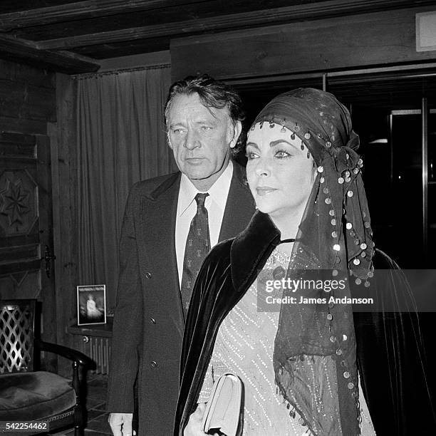 British husband-and-wife actors Elizabeth Taylor and Richard Burton spend Christmas in their chalet in Gstaad after the couple remarried in October.