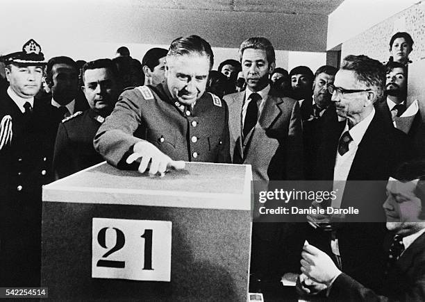 General Augusto Pinochet casts his vote during a referendum in Chile in 1980. 67% of the Chilean population have voted for Pinochet's constitution,...