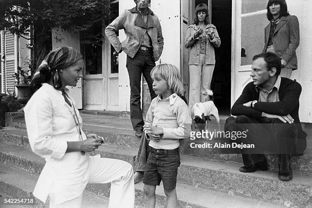 Austrian-born German actress Romy Schneider with her son David and French actor Jean-Louis Trintignant on the set of Le Train, based on the novel by...