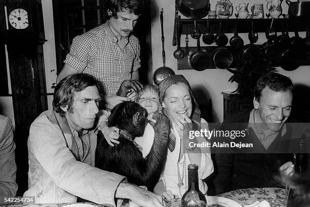 Austrian-born German actress Romy Schneider, her son David and French actor Jean-Louis Trintignant with director Pierre Granier-Deferre on the set of...